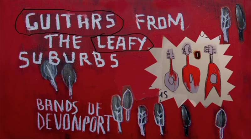 Painting saying 'Guitars from the Leafy Suburbs, Bands of Devonport'